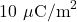 10~\mu\mathrm{C/m}^2