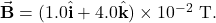 \vec{\mathbf{B}}=(1.0\hat{\mathbf{i}}+4.0\hat{\mathbf{k}})\times10^{-2}~\mathrm{T}.
