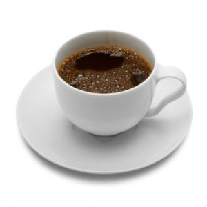 A cup of black coffee.