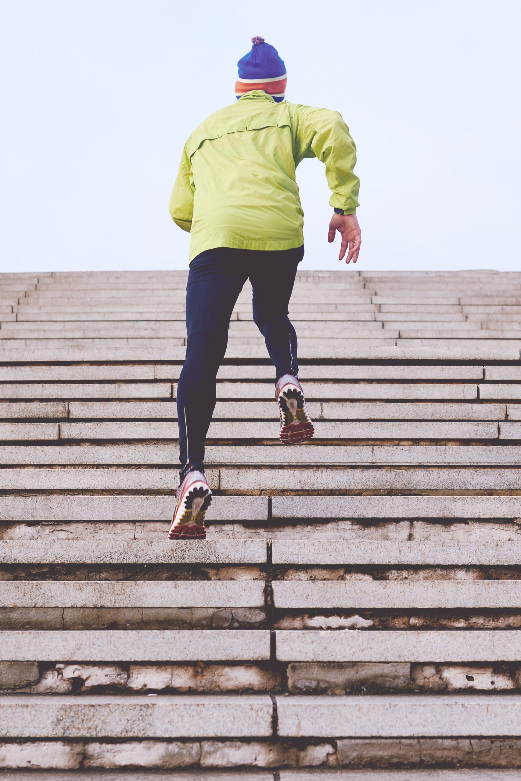 A person running up stairs outside.