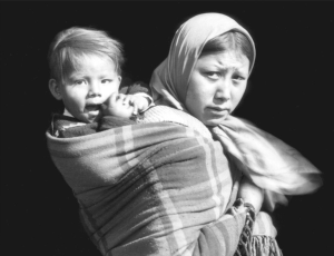 Mother carrying child