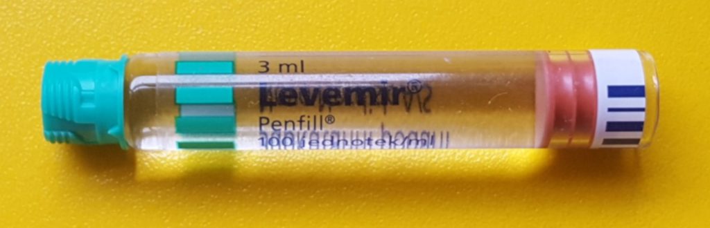 "Insulin analog 100 IU-1ml penfill levemir yellow background.jpg" by Wesalius is licensed under CC BY 4.0 Photo showing vial used in Levemir insulin pen.