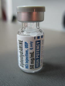 "diphenhydramine (1)" by M is licensed under CC BY-NC 2.0 Photo of diphenhydramine HCI bottle.