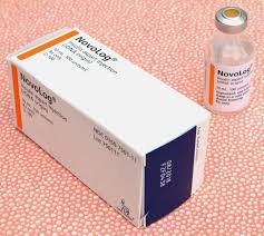 "Untitled" by Pxhere is licensed under CC0 Photo showing package of Novalog with vial next to it.