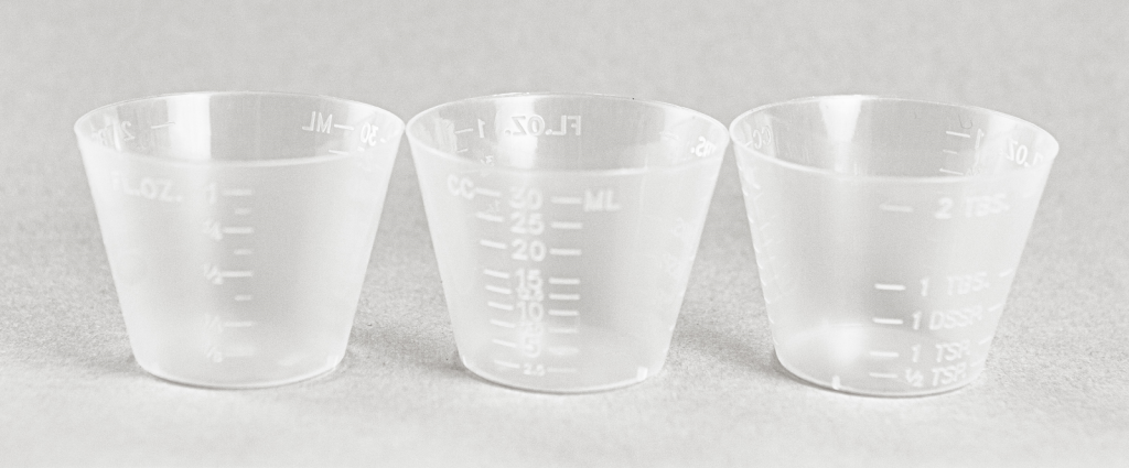 “Medication Cups" by Deanna Hoyord, Chippewa Valley Technical College is licensed under CC BY 4.0 Photo showing three medication