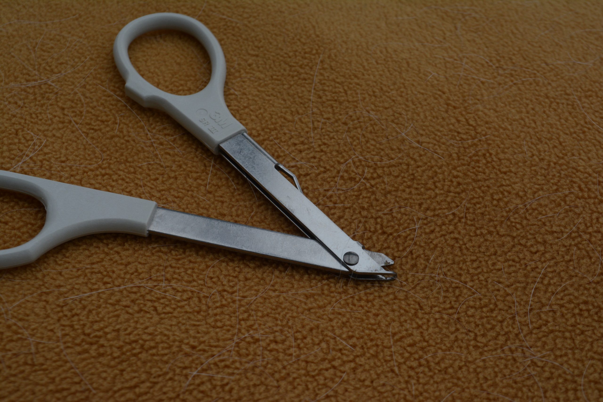 “Not quite scissors - TROML - 1366” by Clint Budd is licensed under CC BY 2.0 Photo showing closeup of a staple remover