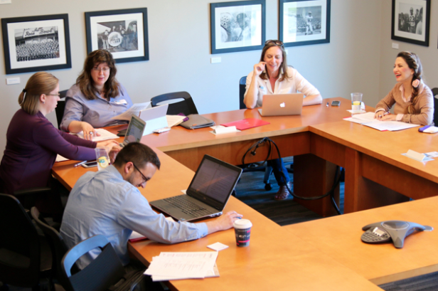 Figure 1: The macroeconomics team working together at the Content Camp pilot in June 2017. Clockwise from the bottom left: Jeffrey Barr, Kaitlin Farnan, Alexandra Nica, Darcy Hartman, Marzi Bolhassani