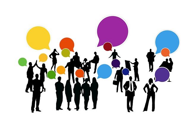 Graphic of many people with multicoloured chat boxes over their heads