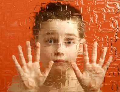 ”5299266366_0b6c8ae172_o” by hepingting is licensed under CC BY-SA 2.0 Photo showing a child looking through wavy glass at viewer