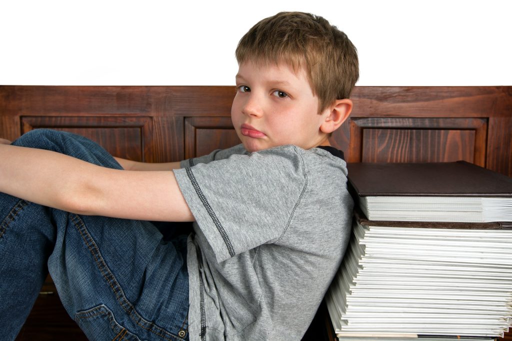 ”sad-gad250898b_1920” by Patrick Audet at Pixabay.com is licensed under CC0 Photo showing a Child Struggling With Symptoms of ADHD