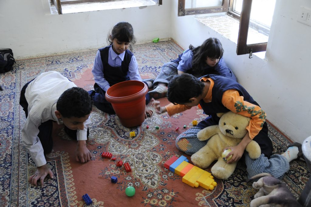 ”4885680339_721cd1843e_k” by World Bank Photo Collection is licensed under CC BY-NC-ND 2.0 Photo of Children With Special Needs Playing together in a room