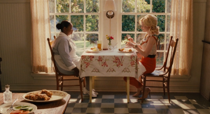 two women seated at a table